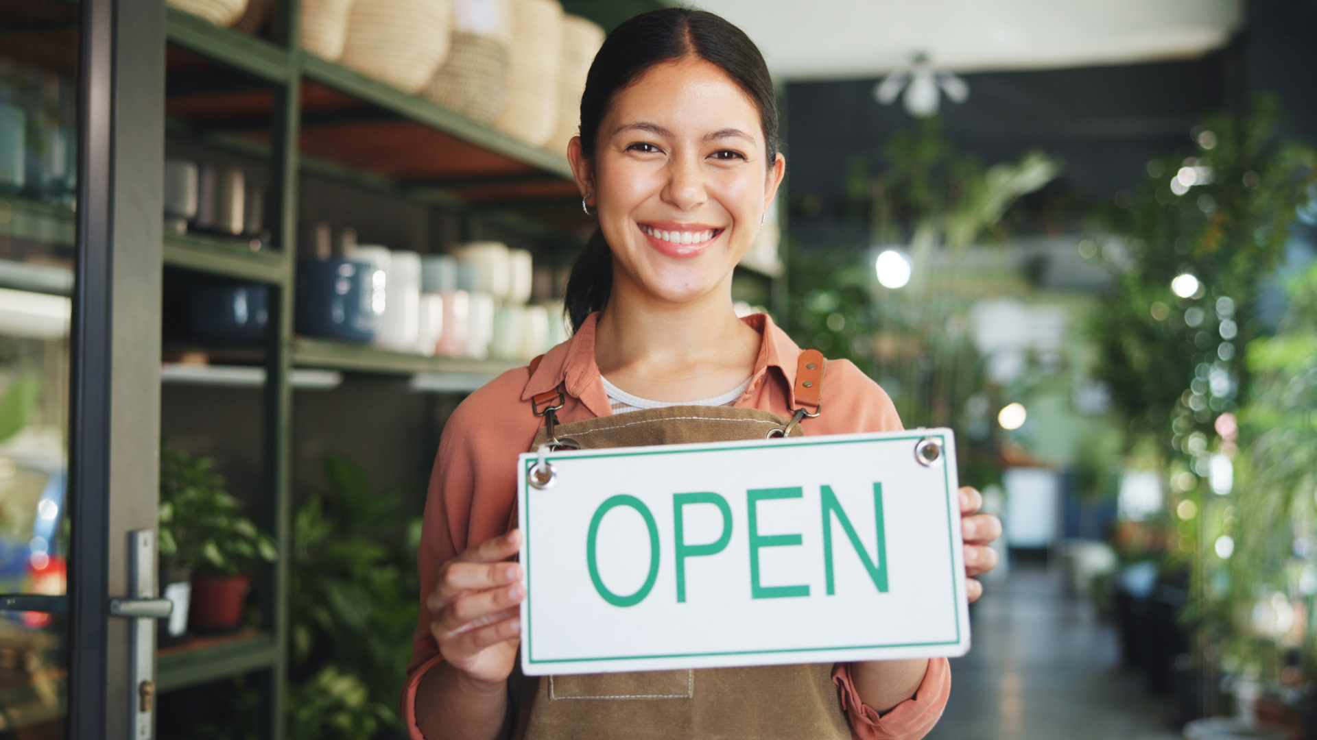 Woman Business Owner With Open Sign 